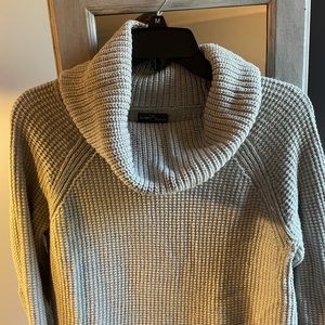Grey cowl next sweater